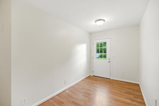 215 Patrick St, Estill Springs, TN 37330 - empty room featuring light wood-style floors and baseboards