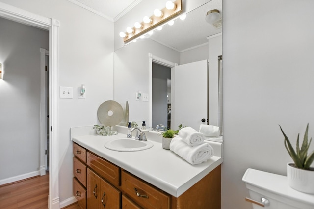 215 Patrick St, Estill Springs, TN 37330 - bathroom featuring ornamental molding, vanity, and wood finished floors