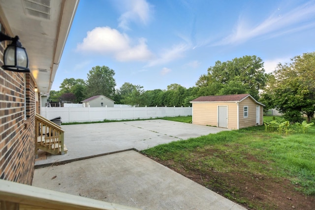 215 Patrick St, Estill Springs, TN 37330 - view of patio / terrace with an outbuilding