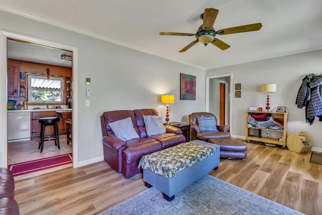 1011 S Baird Ln, Murfreesboro, TN 37130 - living room featuring a ceiling fan, light wood finished floors, and ornamental molding