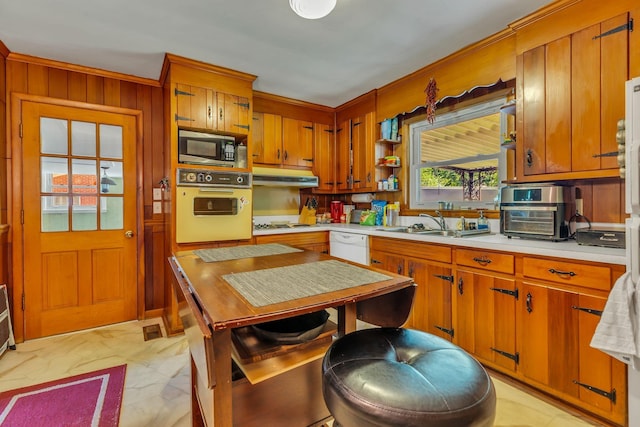 1011 S Baird Ln, Murfreesboro, TN 37130 - kitchen with oven, light countertops, stainless steel microwave, dishwasher, and brown cabinets
