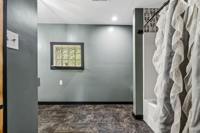 140 Cane Creek Rd, Hohenwald, TN 38462 - bathroom featuring shower / tub combo with curtain, recessed lighting, and marble finish flooring
