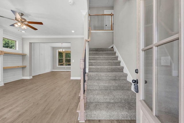 578 Pongracz Way, Clarksville, TN 37042 - stairway with ceiling fan, crown molding, wood finished floors, and a chandelier