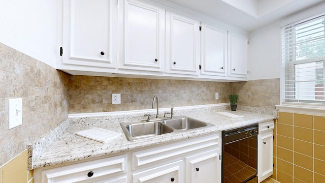 1002 E Northfield Blvd Unit G105, Murfreesboro, TN 37130 - kitchen with dishwasher, tile walls, white cabinets, and healthy amount of natural light