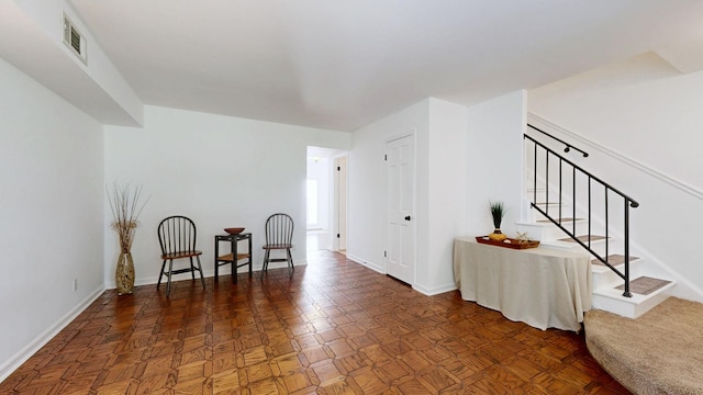 1002 E Northfield Blvd Unit G105, Murfreesboro, TN 37130 - sitting room featuring stairs and baseboards