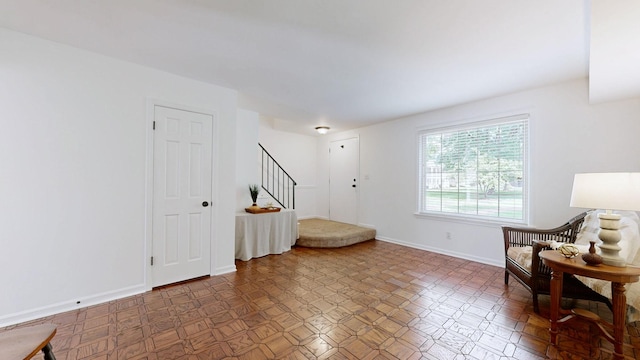 1002 E Northfield Blvd Unit G105, Murfreesboro, TN 37130 - living area featuring stairway and baseboards