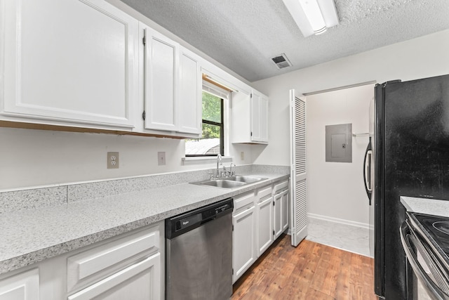 2200 Rawls Rd, Greenbrier, TN 37073 - kitchen featuring stainless steel dishwasher, electric panel, white cabinetry, light countertops, and black / electric stove