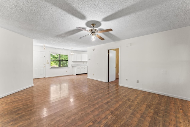 2200 Rawls Rd, Greenbrier, TN 37073 - unfurnished room featuring a ceiling fan, a textured ceiling, and wood finished floors