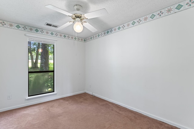 2200 Rawls Rd, Greenbrier, TN 37073 - carpeted empty room featuring a textured ceiling and a ceiling fan