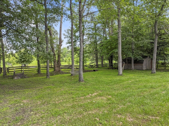 2200 Rawls Rd, Greenbrier, TN 37073 - view of yard featuring a storage unit
