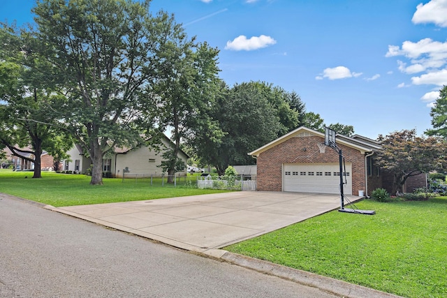 509 Iris Ave, Murfreesboro, TN 37128 - view of front facade with brick siding, concrete driveway, and a garage