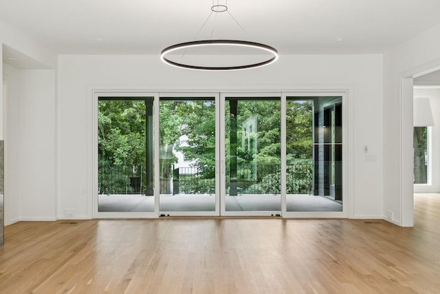 4045 Outer Dr, Nashville, TN 37204 - unfurnished dining area featuring wood finished floors and baseboards