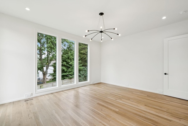 4045 Outer Dr, Nashville, TN 37204 - unfurnished room with a chandelier, light wood-style floors, recessed lighting, and a smoke detector