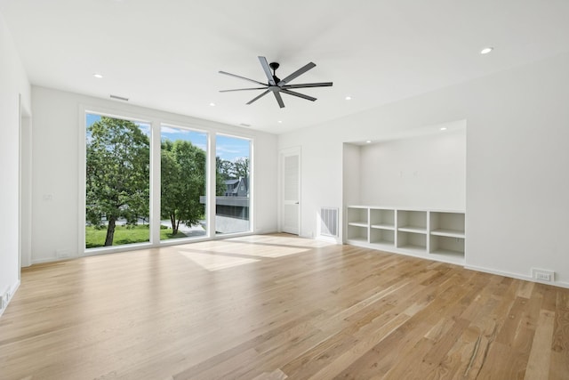 4045 Outer Dr, Nashville, TN 37204 - empty room with light wood-type flooring, ceiling fan, recessed lighting, and built in shelves