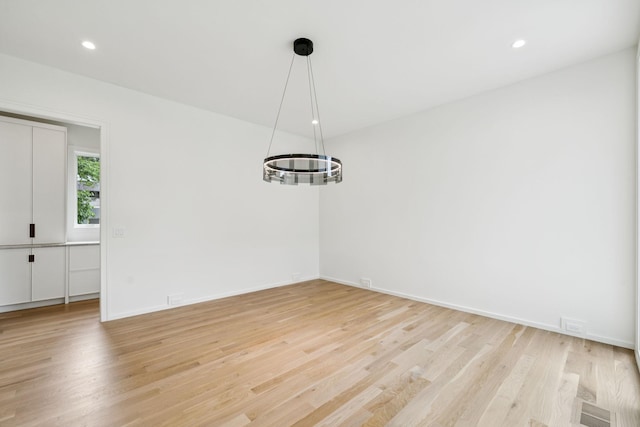 4045 Outer Dr, Nashville, TN 37204 - unfurnished room featuring light wood finished floors, a chandelier, and recessed lighting