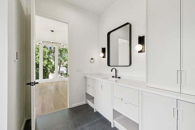 4045 Outer Dr, Nashville, TN 37204 - bathroom with a chandelier and vanity