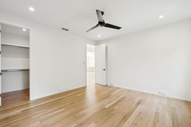 4045 Outer Dr, Nashville, TN 37204 - unfurnished bedroom with recessed lighting, a walk in closet, light wood finished floors, a ceiling fan, and a closet