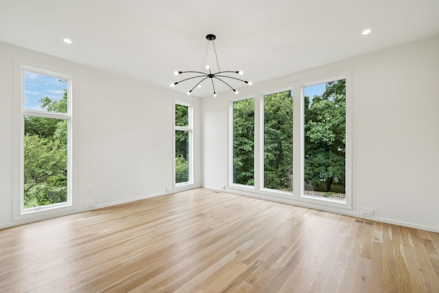 4045 Outer Dr, Nashville, TN 37204 - empty room with a chandelier, healthy amount of natural light, light wood-style floors, and recessed lighting