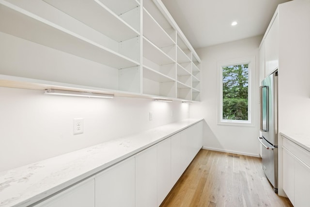 4045 Outer Dr, Nashville, TN 37204 - kitchen featuring white cabinetry, light wood-type flooring, open shelves, stainless steel fridge, and recessed lighting