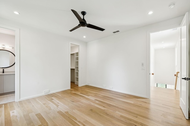 4045 Outer Dr, Nashville, TN 37204 - unfurnished bedroom with light wood-style floors, recessed lighting, ensuite bath, a walk in closet, and a ceiling fan