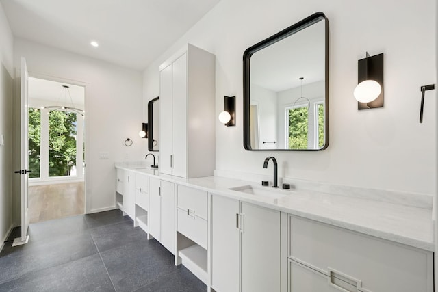 4045 Outer Dr, Nashville, TN 37204 - bathroom featuring double vanity and recessed lighting