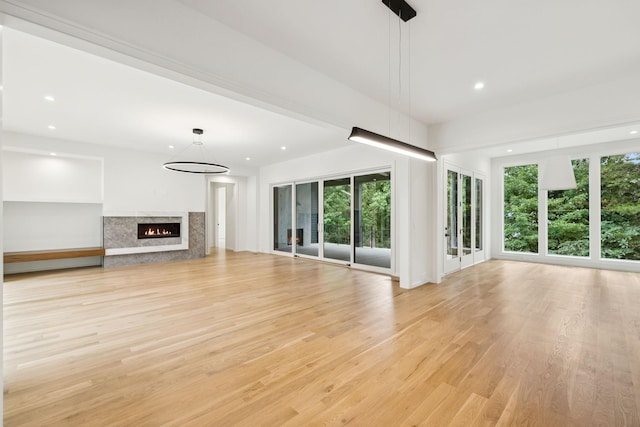 4045 Outer Dr, Nashville, TN 37204 - unfurnished living room featuring light wood-style flooring, recessed lighting, and a fireplace