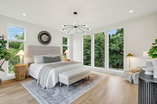 4045 Outer Dr, Nashville, TN 37204 - bedroom with a chandelier, light wood-style floors, and recessed lighting