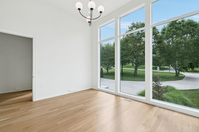 4045 Outer Dr, Nashville, TN 37204 - unfurnished dining area featuring a chandelier and light wood-style flooring