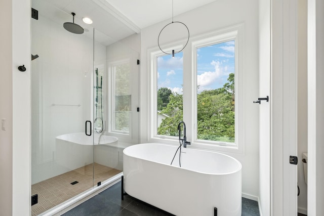 4045 Outer Dr, Nashville, TN 37204 - full bathroom featuring a stall shower, plenty of natural light, and a soaking tub