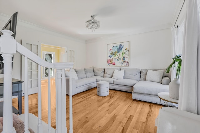 1903 Palmer Dr, Springfield, TN 37172 - living room featuring ornamental molding, light wood-style flooring, and stairs