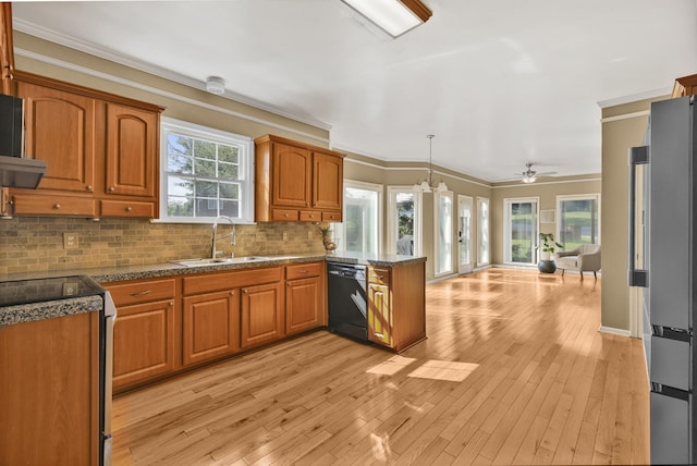 1903 Palmer Dr, Springfield, TN 37172 - kitchen with stainless steel appliances, a peninsula, brown cabinetry, crown molding, and backsplash