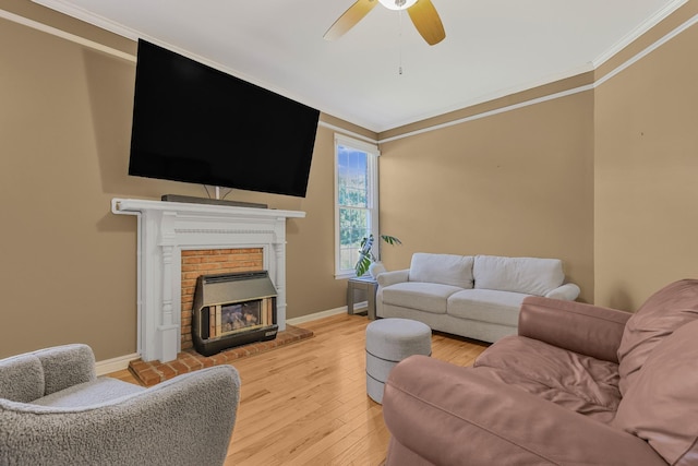 1903 Palmer Dr, Springfield, TN 37172 - living area featuring ornamental molding, wood finished floors, a ceiling fan, and a brick fireplace