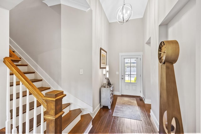 2030 Oliver Dr, Mount Juliet, TN 37122 - entrance foyer featuring dark wood-style floors, stairs, a high ceiling, and a chandelier