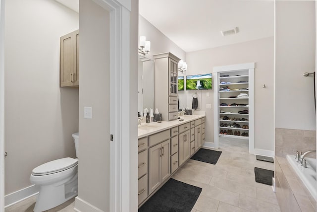 2030 Oliver Dr, Mount Juliet, TN 37122 - full bathroom with double vanity, a bath, tile patterned flooring, and a spacious closet