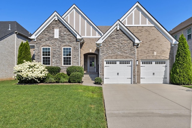 2030 Oliver Dr, Mount Juliet, TN 37122 - view of front facade featuring driveway, stone siding, a front yard, and stucco siding