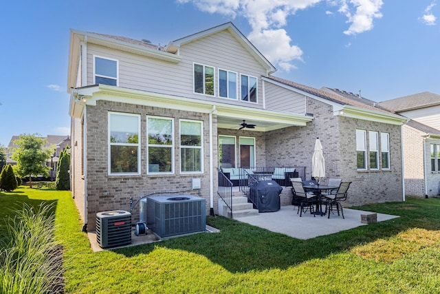 2030 Oliver Dr, Mount Juliet, TN 37122 - rear view of property featuring a yard, a patio area, a ceiling fan, and brick siding