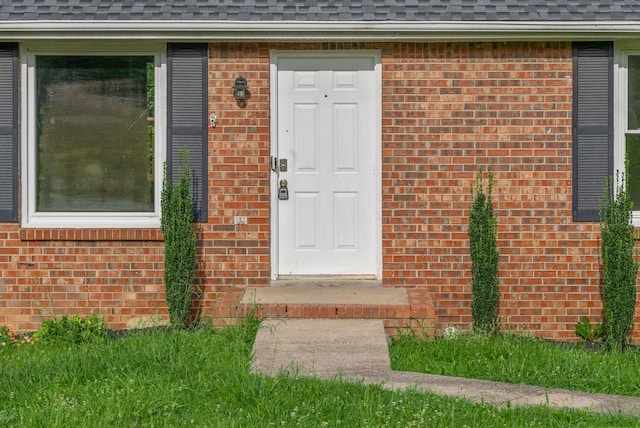 712 Green Valley Ct, Clarksville, TN 37042 - property entrance featuring brick siding and roof with shingles