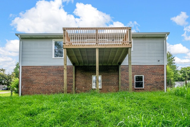 712 Green Valley Ct, Clarksville, TN 37042 - rear view of house with brick siding and a deck