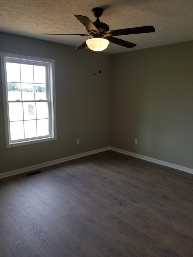 3101 Galen Rd, Lafayette, TN 37083 - spare room featuring dark wood finished floors and ceiling fan
