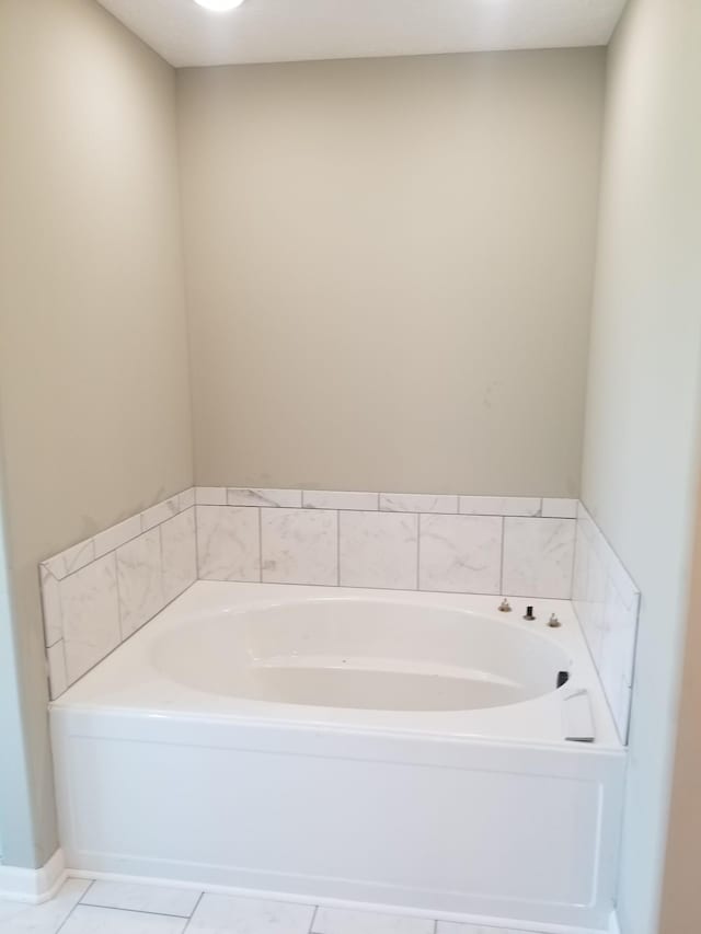 3101 Galen Rd, Lafayette, TN 37083 - full bathroom with a garden tub and tile patterned flooring