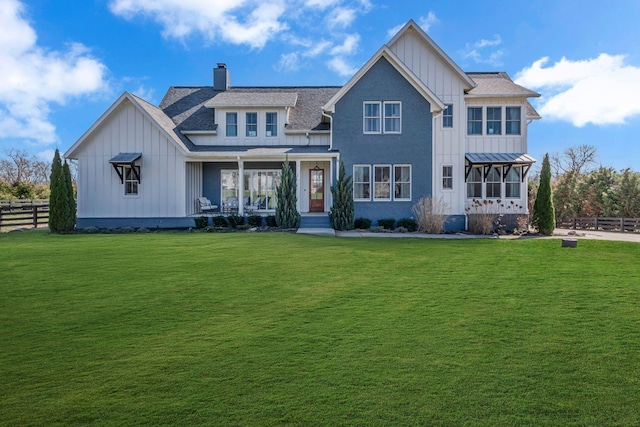 2113 Southern Preserve Ln, Franklin, TN 37064 - back of house featuring board and batten siding, a porch, a chimney, a standing seam roof, and a shingled roof