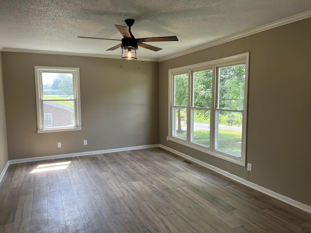 208 Skyline Dr, Red Boiling Springs, TN 37150 - unfurnished room featuring ornamental molding, a textured ceiling, healthy amount of natural light, wood finished floors, and a ceiling fan