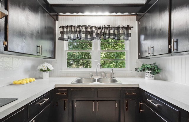 1885 N Soules Chapel Rd, Cunningham, TN 37052 - kitchen with light countertops, black electric stovetop, and crown molding