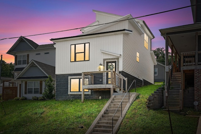 76 W High St, Clarksville, TN 37040 - view of front of home with stairs and a lawn