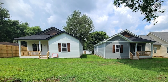 4211 Woods St, Old Hickory, TN 37138 - back of property featuring a porch, board and batten siding, crawl space, and a shingled roof