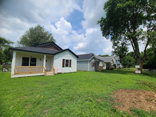 4211 Woods St, Old Hickory, TN 37138 - view of front facade with covered porch, a front lawn, and roof with shingles