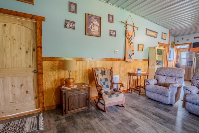 357 Providence Rd, Pulaski, TN 38478 - sitting room featuring a wainscoted wall, wood walls, and wood finished floors