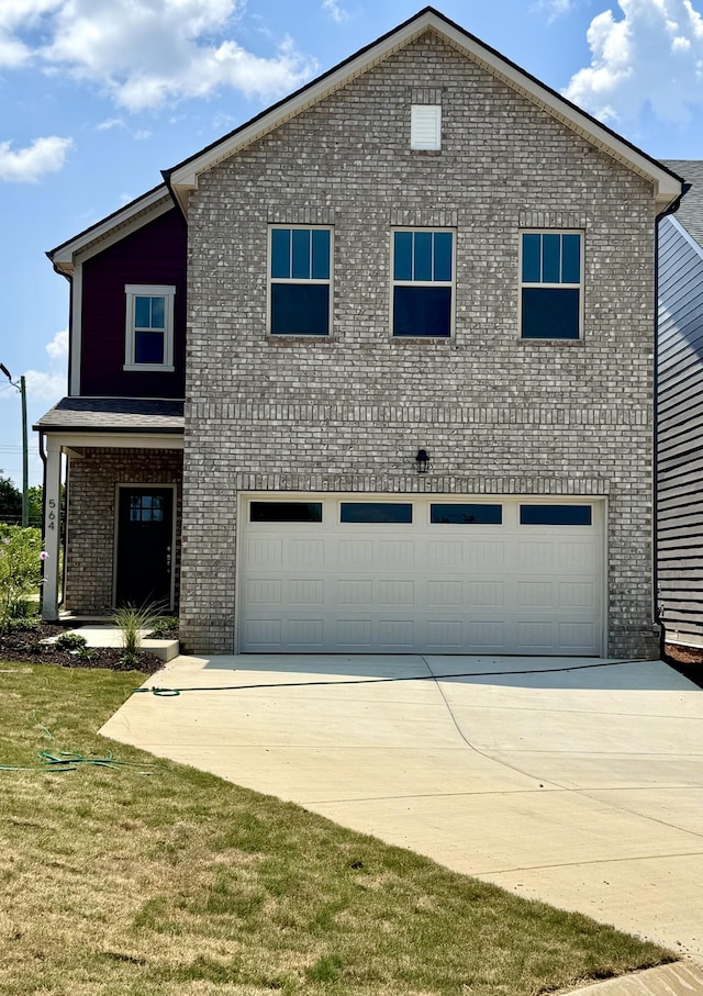 564 Twyla Dr, Lebanon, TN 37087 - traditional home with a garage, brick siding, concrete driveway, and a front lawn