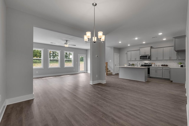 564 Twyla Dr, Lebanon, TN 37087 - kitchen featuring stainless steel appliances, open floor plan, gray cabinetry, recessed lighting, and dark wood-style floors