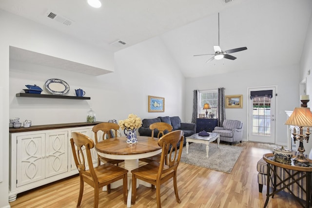 4858 Chelanie Cir, Murfreesboro, TN 37129 - dining area with light wood-style floors, a ceiling fan, and high vaulted ceiling